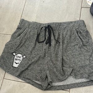 Grey shorts with “gone batty” patch size small
